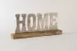 Preview: Deko Buchstaben HOME auf Regal oder Kommode