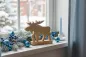 Preview: Massiver Elch aus Mangoholz in Braun – perfekte Holzfigur für winterliche Stimmung