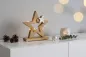 Preview: Stern aus Mangoholz mit glänzendem Metallstern – stilvolle Weihnachtsdekoration