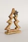Preview: Moderner Holz-Tannenbaum geschmückt mit glänzendem Metallstern – festliche Stimmung