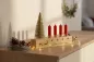 Preview: Kerzenständer Advent aus Buche Holz mit vier Kerzenhaltern festlich dekoriert