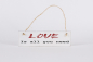 Preview: Deko-Schild „Love is all you need“ aus Holz – rustikale Vintage Wanddekoration mit handgefertigtem Look