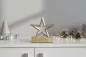 Preview: Stern aus Metall auf Holzsockel silber – elegante Weihnachtsdekoration