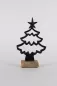 Preview: Tannenbaum aus schwarzem Metall auf Holzsockel – elegante Weihnachtsdekoration