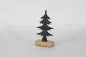 Preview: Weihnachtsbaum aus schwarzem Metall auf Holzsockel – moderne Deko für Ihr Zuhause
