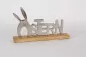 Preview: Schriftzug Ostern silber auf Fensterbank arrangiert