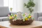 Preview: Dekorativer Vogel aus MDF in Weiß mit Blumenaufdruck – perfekte Tischdeko für Frühling & Sommer.