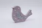 Preview: Dekorativer Vogel aus MDF in Rosa mit Blumenaufdruck – perfekte Tischdeko für Frühling & Sommer.