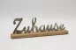 Preview: Eleganter Metall Schriftzug Zuhause als Tischdekoration