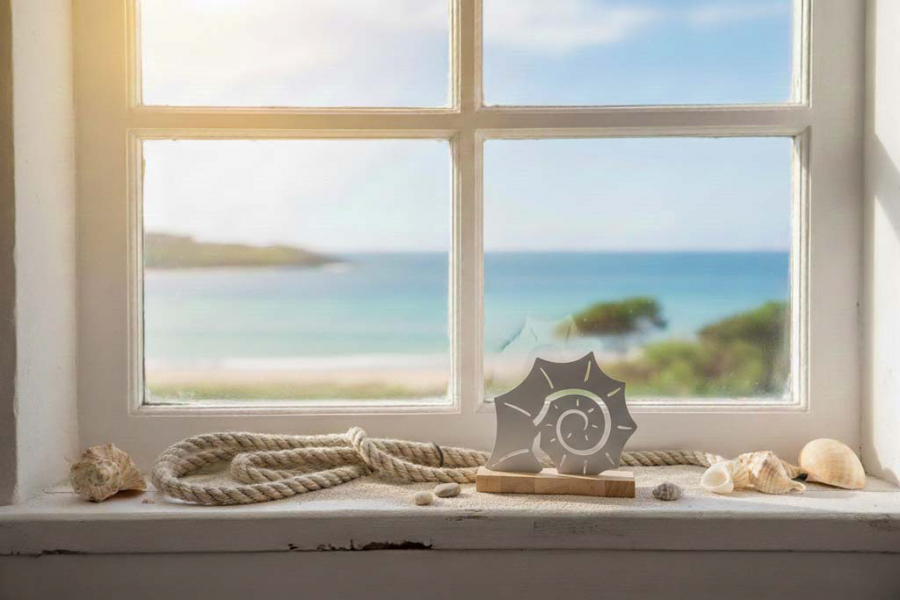 Preview: Muschel aus Metall auf Holz maritim