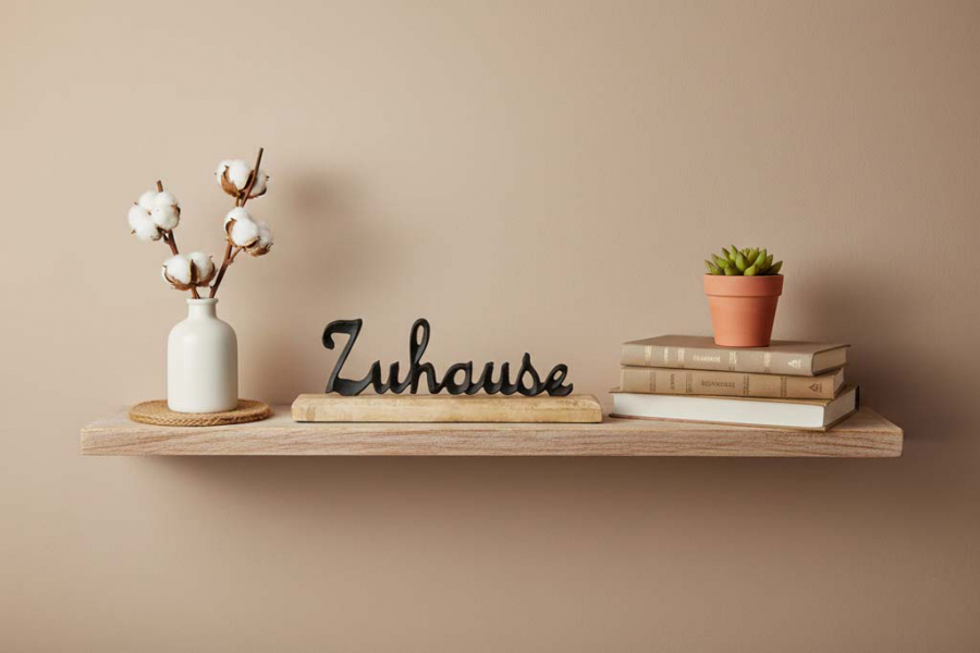 Preview: Schriftzug Zuhause aus schwarzem Metall als Wanddeko