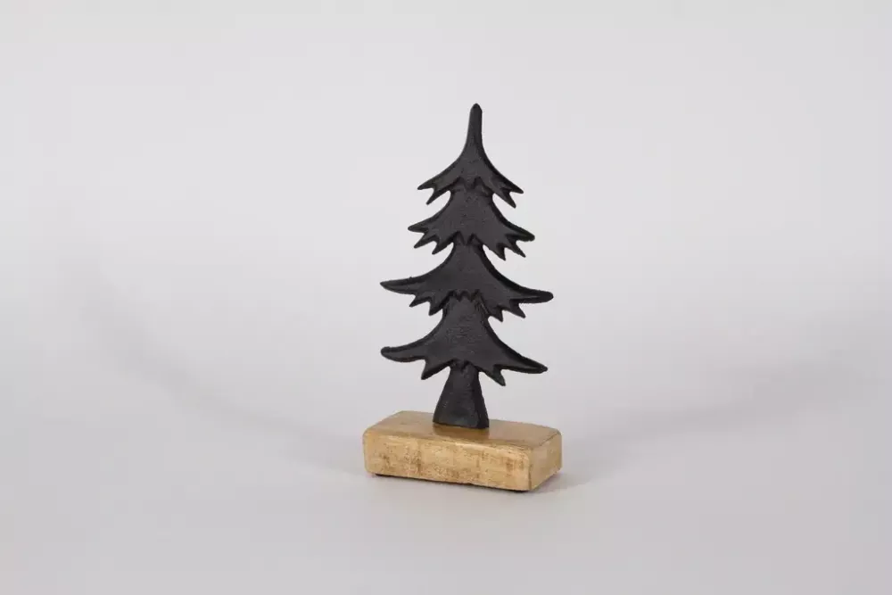 Weihnachtsbaum aus schwarzem Metall auf Holzsockel – moderne Deko für Ihr Zuhause